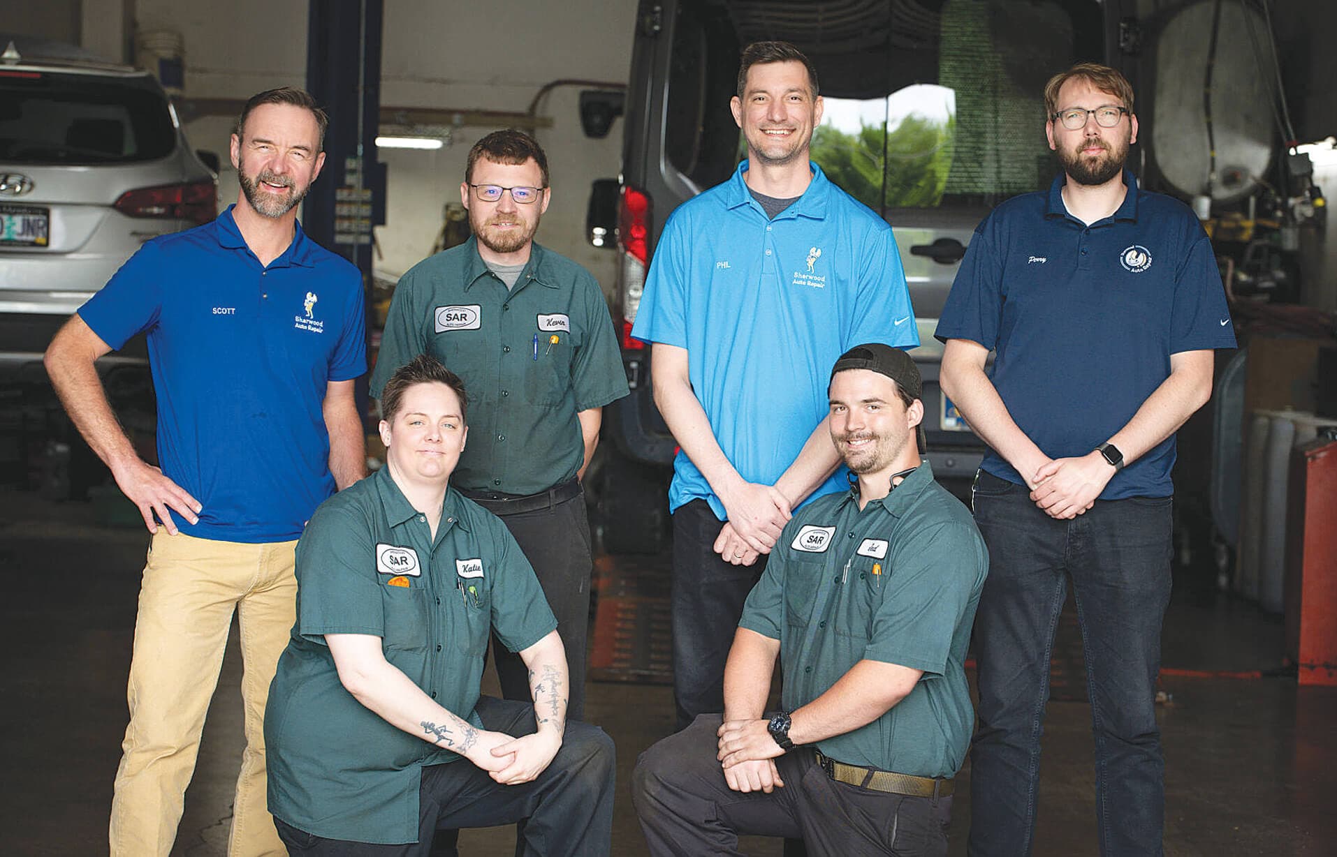 Sherwood Auto Repair team in shop
